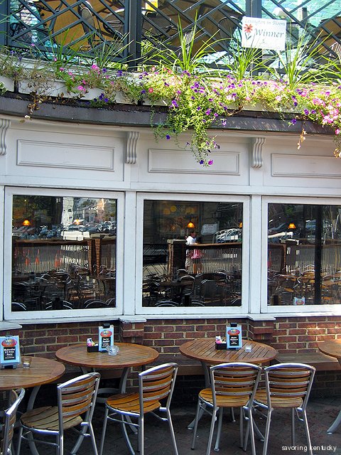 Windows overlook the exterior patio at Cheapside Bar & Grill, Lexington, Kentucky