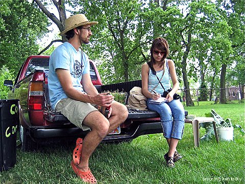 Ryan and an interviewer in London Ferrell Community Garden