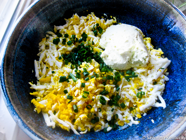 Grated hard-boiled eggs, chives, homemade mayonnaise for egg salad