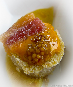 Fresh ham on socca with smoked paprika cream, guanciale chip, and pickled mustard, from American Grocery Restaurant in Greenville, SC
