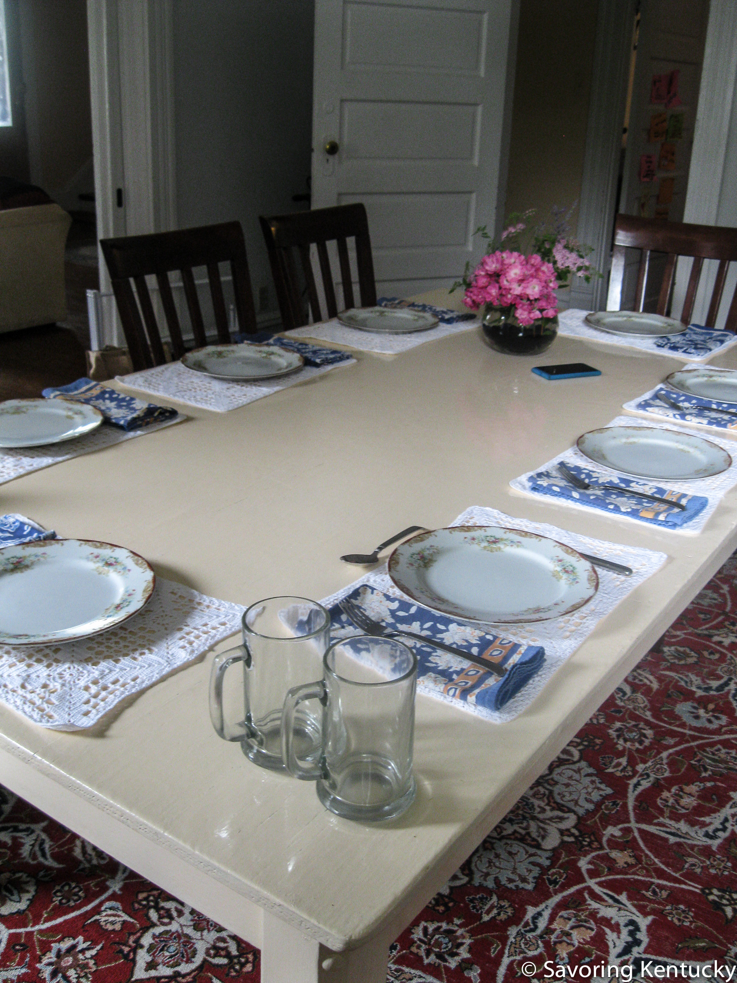 Libby Kelly Allen begins to work her stylish magic on the table.