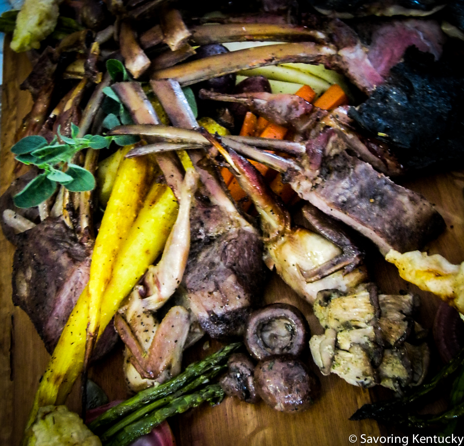 Field & Flight: Kentucky Horse Park Chef Adam Wade's apple & cherry-smoked lemon thyme Kentucky quail and pecan, smoked Kentucky Lamb (producer Eileen O'Donohue) with a coriander espresso rub, and collage of fresh garden vegetables and mushrooms