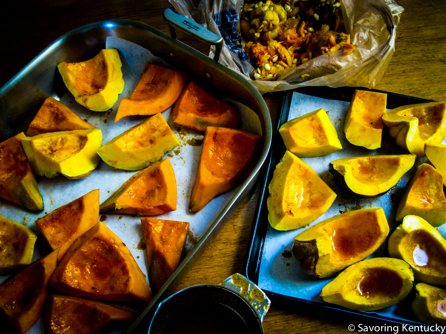 A mix of winter squashes ready for roasting: cut and rubbed with a seat-of-the-pants blend, below; seeds and pith extracted for the neighborhood chickens, above. (Better people than we are might clean, roast, and eat those seeds, but at least we put them to good use!)