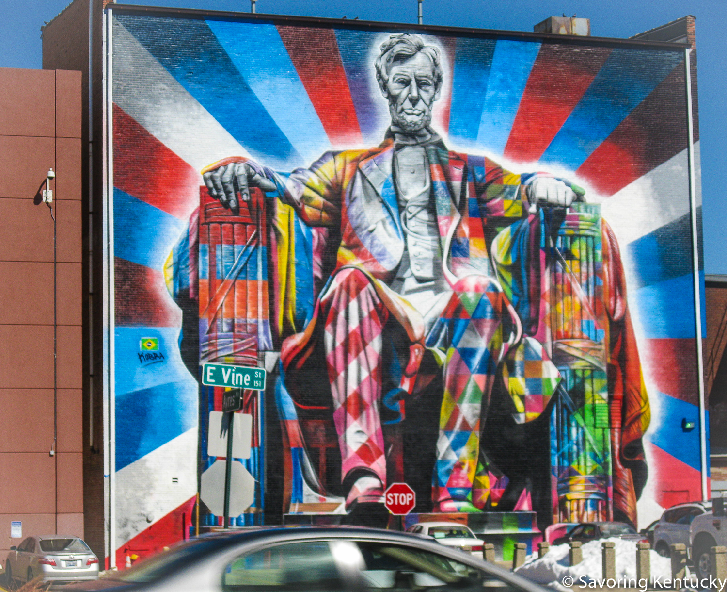 Abe sits in the thick of things, right where he liked to be, on Vine Street in Lexington, in this spectacular Eduardo Kobra mural.