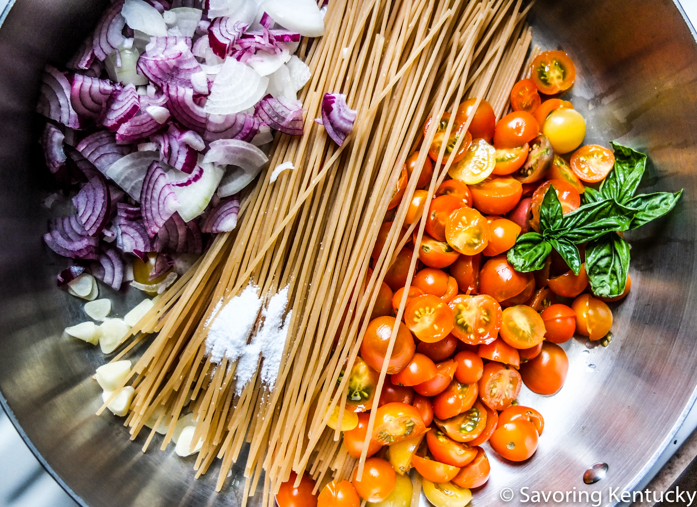 According to sourcing, this was a Kentuck-italian dish. Tomatoes: Elmwood Stock Farm . Onions: Blue Moon Farm . Garlic and basil: Campsie gardens. Olive oil: Bill Sanders First Fresh 3 Village Blend.
