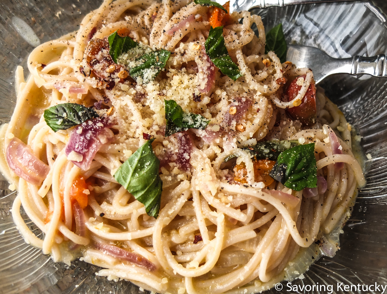 The results. Much of the overall flavor came from the toppings: fresh basil, decent Parmesan, a tiny bit of crushed red pepper, which was supposed to be in the pasta, but offends some of the anticipated eaters. We adjust as we must.