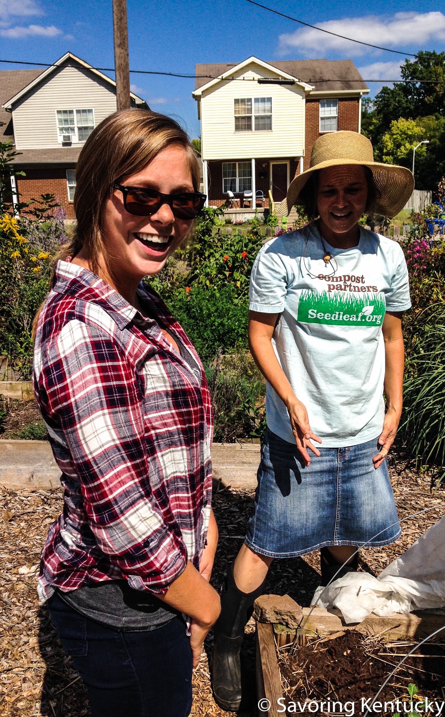 Morgan Miller, left, visits with Sherry Maddock at The 4th Street Farm in downtown Lexington.