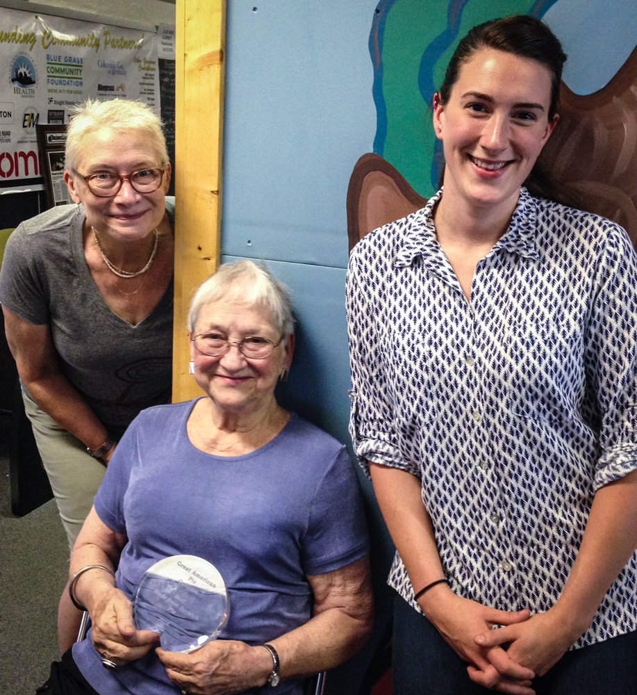 From left in the Lexington Community Radio studio: Rona Roberts, Hot Water Cornbread host; Loris Points, acclaimed retired teacher, activist, and now Lexington's Great American Pie contest Made-From-Scratch Champion , with her Rhubarb Apple Pie; Grace Carson, AmeriCorps VISTA volunteer with Bluegrass Farm to Table and Bluegrass Double Dollars . Photo credit: Chuck Clenney--thank you!