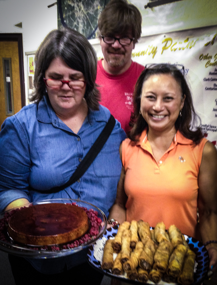 Co-hosts Ouita Michel, left, and Chris Michel, center cannot believe their good fortune when they see the Philippine-inflected food radio guest Rowena Mahloch has cooked and brought to the Lexington Community Radio Studios. Indescribably good, people! Get yourself a radio show and maybe you'll get this lucky!