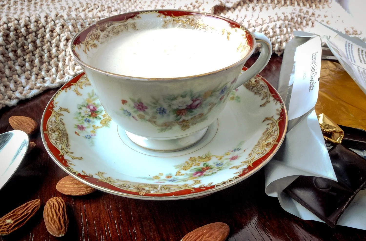 Almond milk with a bit of Chocolove dark chocolate stirred in. Mother and Dad's 1938 "china" from Japan. Linens by Judy Rosen.