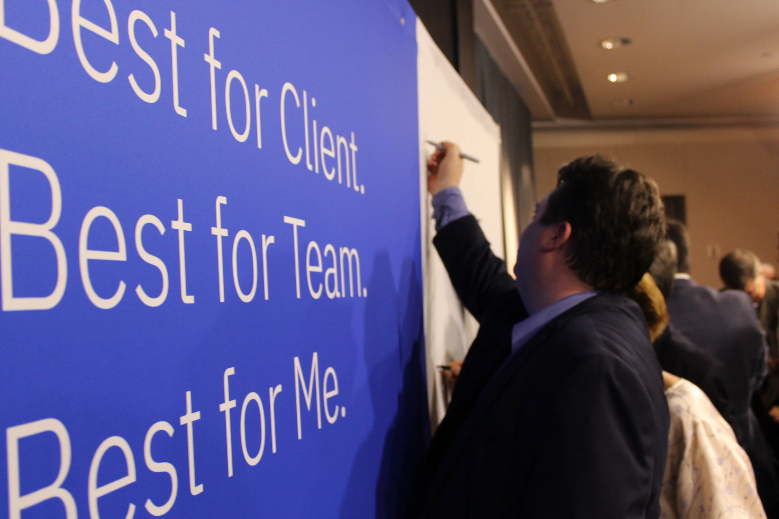 At the close of the summits, every person signed a flag that travelled around the world to each location, culminating in every participant’s signature.