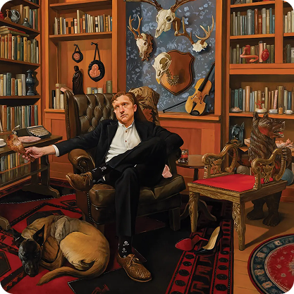 A man in a black suit sits in a vintage leather armchair with his feet up, surrounded by a dog lying on the floor and a statue of a dog on a small ornate table. The room features bookshelves filled with books, mounted animal skulls, and decorative objects, with warm lighting and a red and black patterned rug.