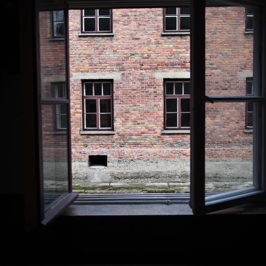 Our tour led us through the bunkhouses - each of these 10x20' rooms would have held 100+ Jewish prisoners as they slept, ate and awaited work each day.