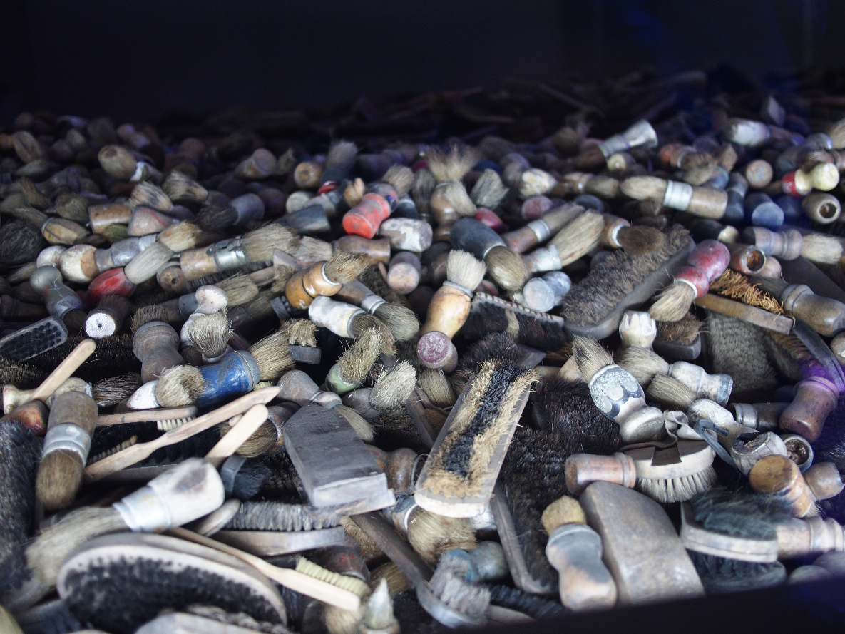 All possessions were confiscated from the Jewish prisoners and housed in buildings called "Canada" - named so because Canada was seen as a land of plenty. Each one of these brushes came from an individual person. There are 10,000s of thousands of them. It's only a small sampling of what was confiscated while Auschwitz was in operation.