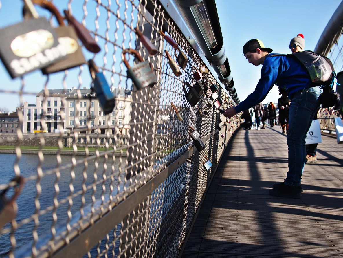A footbridge that crosses the Vistula River in Krakow is burdened with "love locks."