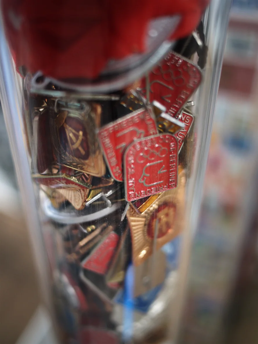 This was a 2-story long tube full of soviet-era pins. Next to it was a column made of discarded diplomas.