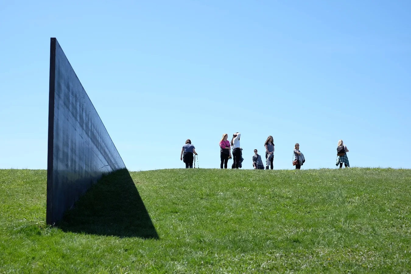 A moment to pose by Richard Serra's partially buried wall.