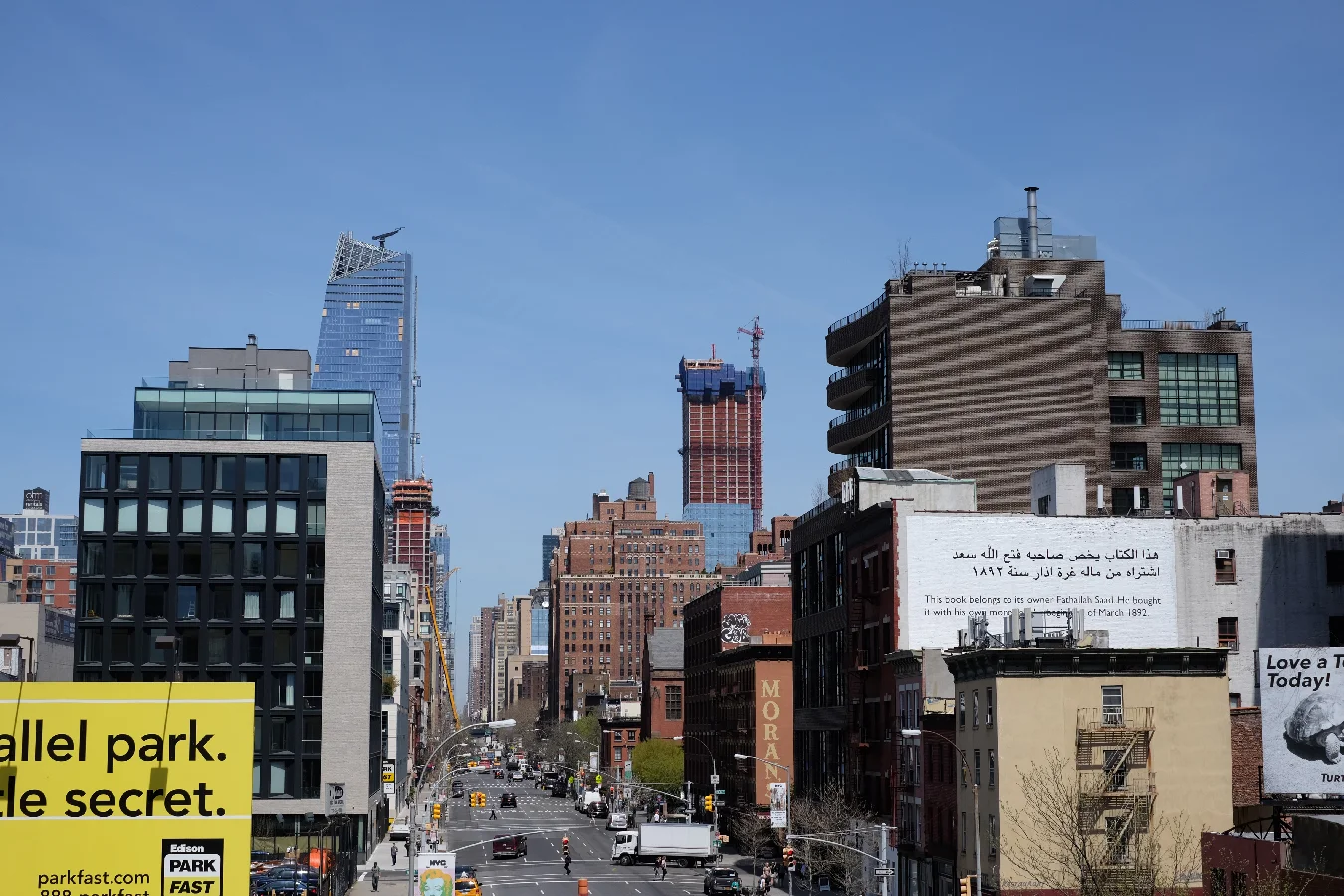 Layers and layers of buildings, signs, people, movement, past and present.