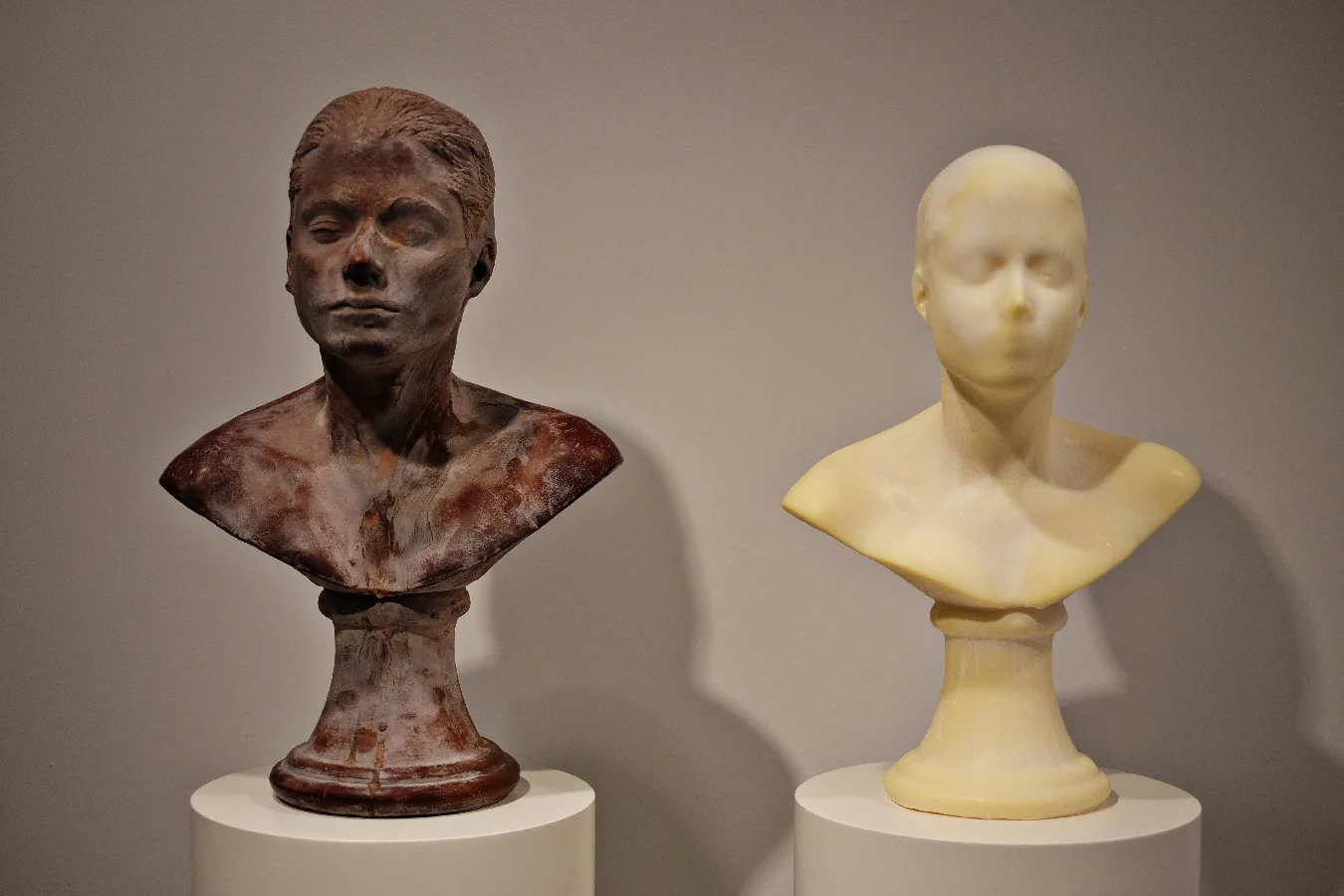 One bust made of chocolate, one made of hand lotion. Part of the Unfinished exhibition at Met Breuer.