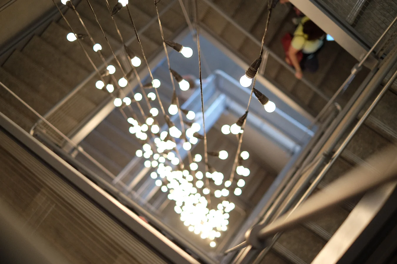 Lights waterfall down the Whitney stairwell.