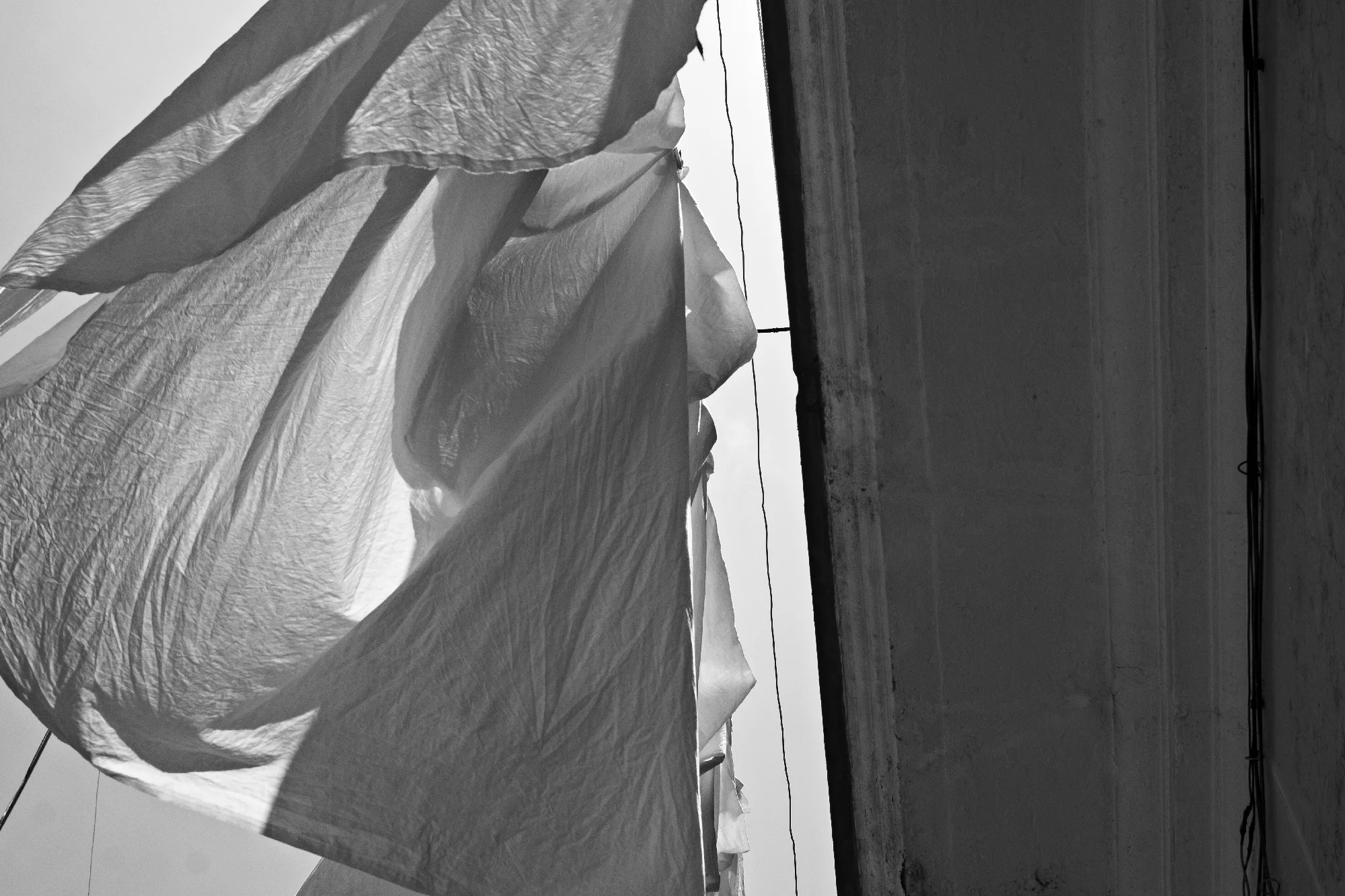 “What’s it like living in a place where white guys walk around and take photos of your laundry?”