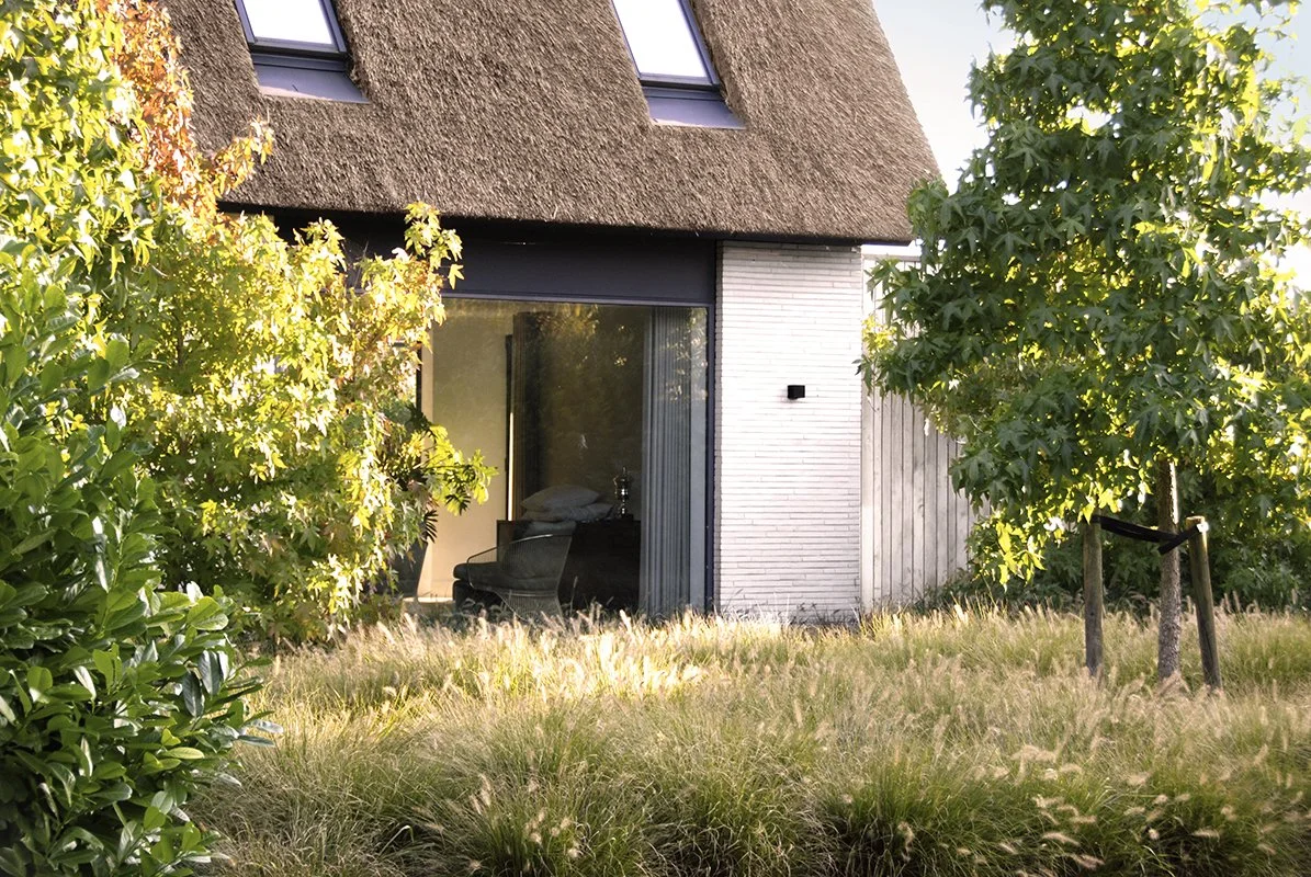 NOMAA modern landelijke luxe villa eigentijdse woning schuurwoning architect zelfbouw kavel erker dakkapel riet rieten dak hoogkarspel streekweg stijlvol wonen excellent  art of living straat.jpg