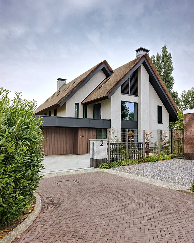 NOMAA modern landelijke woning villa royaal luxe architect riet wit zwart strak art of living amstelveen tjalk golfbaan landing.jpg