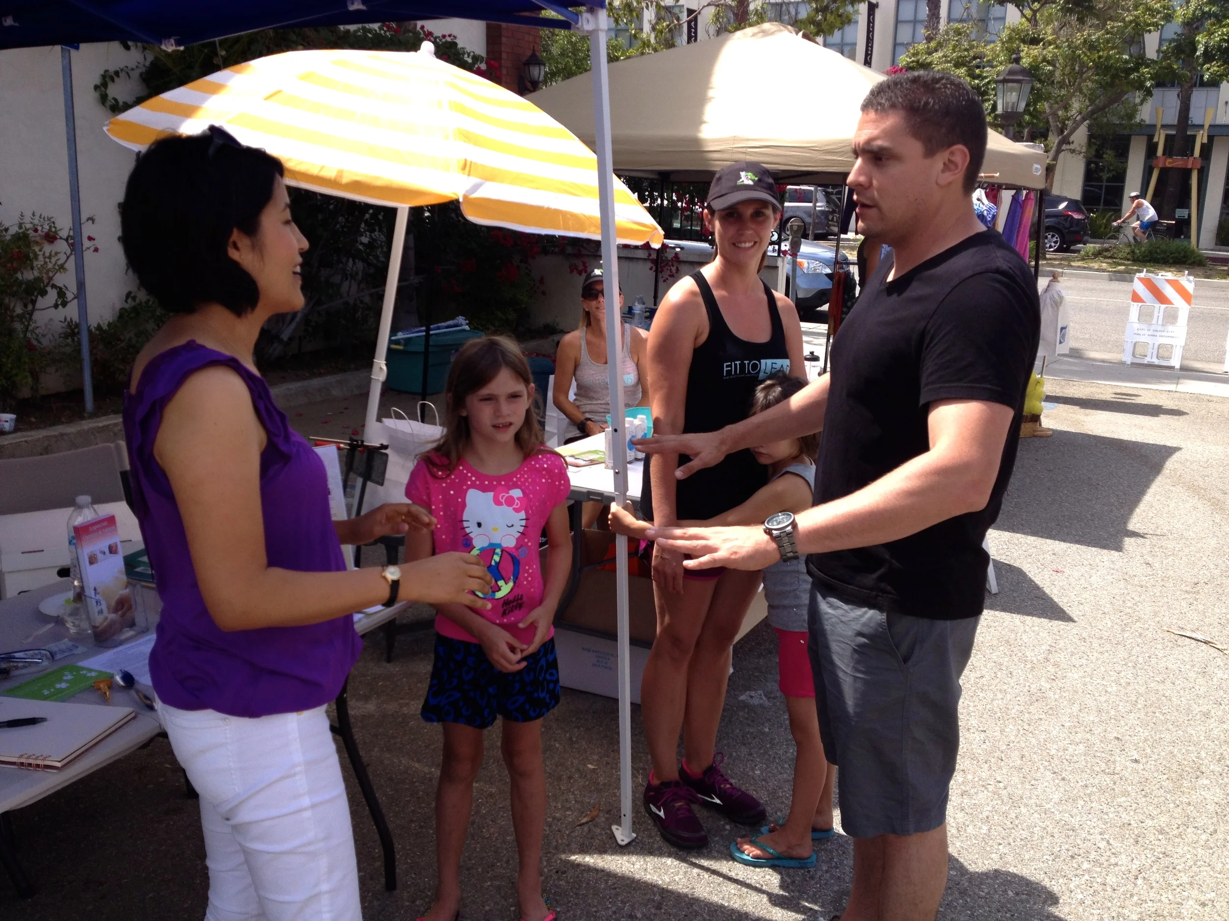 I'm explaining to this family of 4 about PAOM. They were intrigued and excited at what help I could offer them..