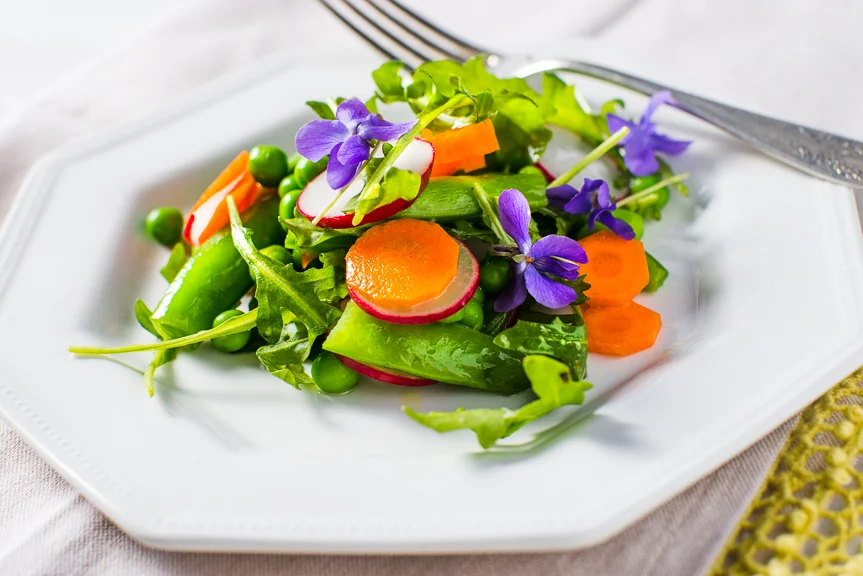 Try some edible flowers for an interesting and colorful garnish.