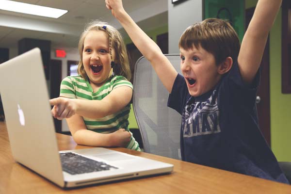 These aspiring freelancers just landed their first client. They are pretty excited... Photo courtesy of Startup Photos