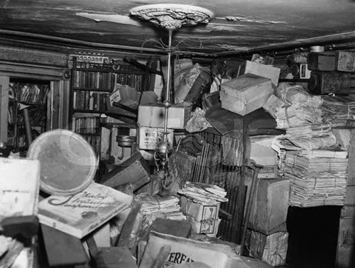 Inside the clutter-filled brownstone where the brothers Homer and Langley Collyer were found dead amid their possessions in 1947. Photo: Associated Press