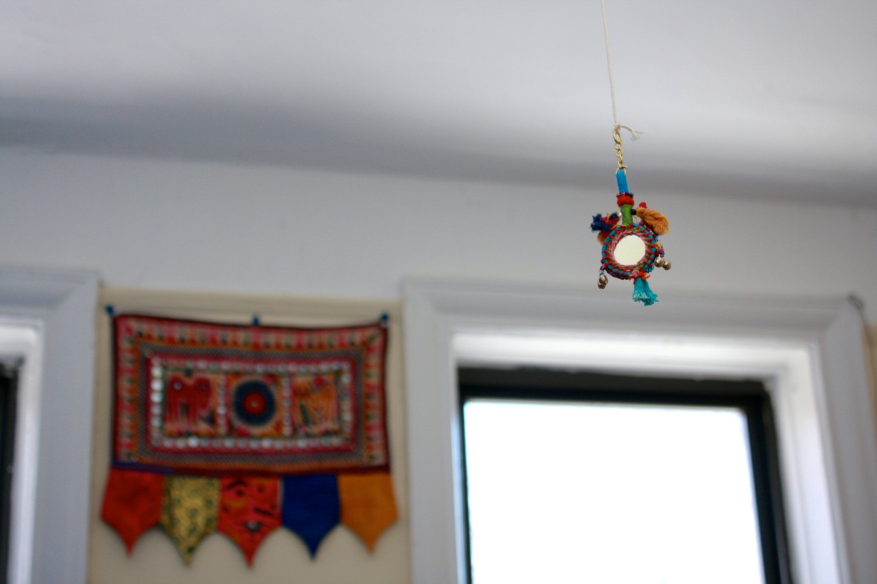 Marta's home is suffused with color and is even in the smallest of details, like these sweet light pulls in every room.
