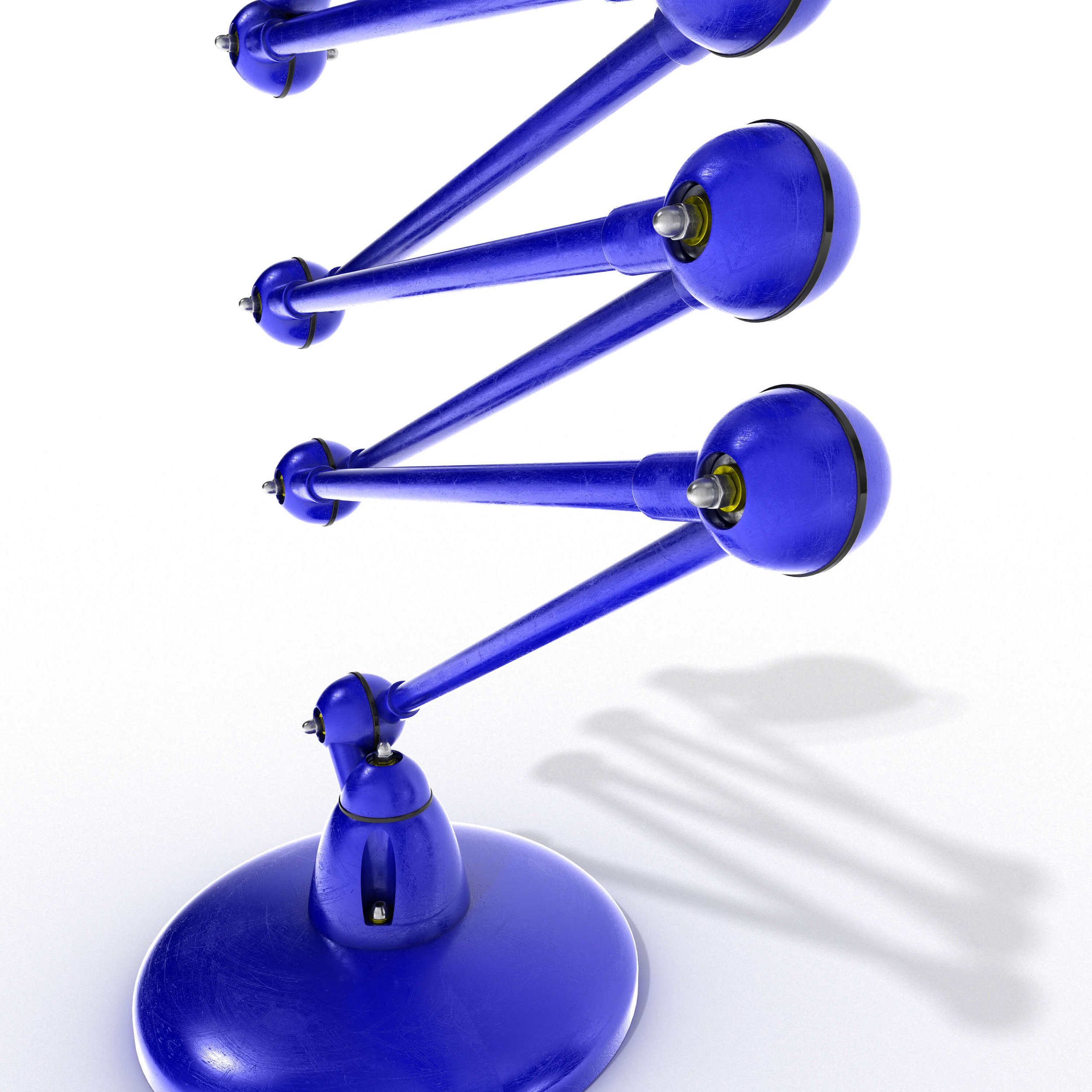 Low rear view of the Jieldé lamp base and structure, emphasising the mechanical arm and lower joints.