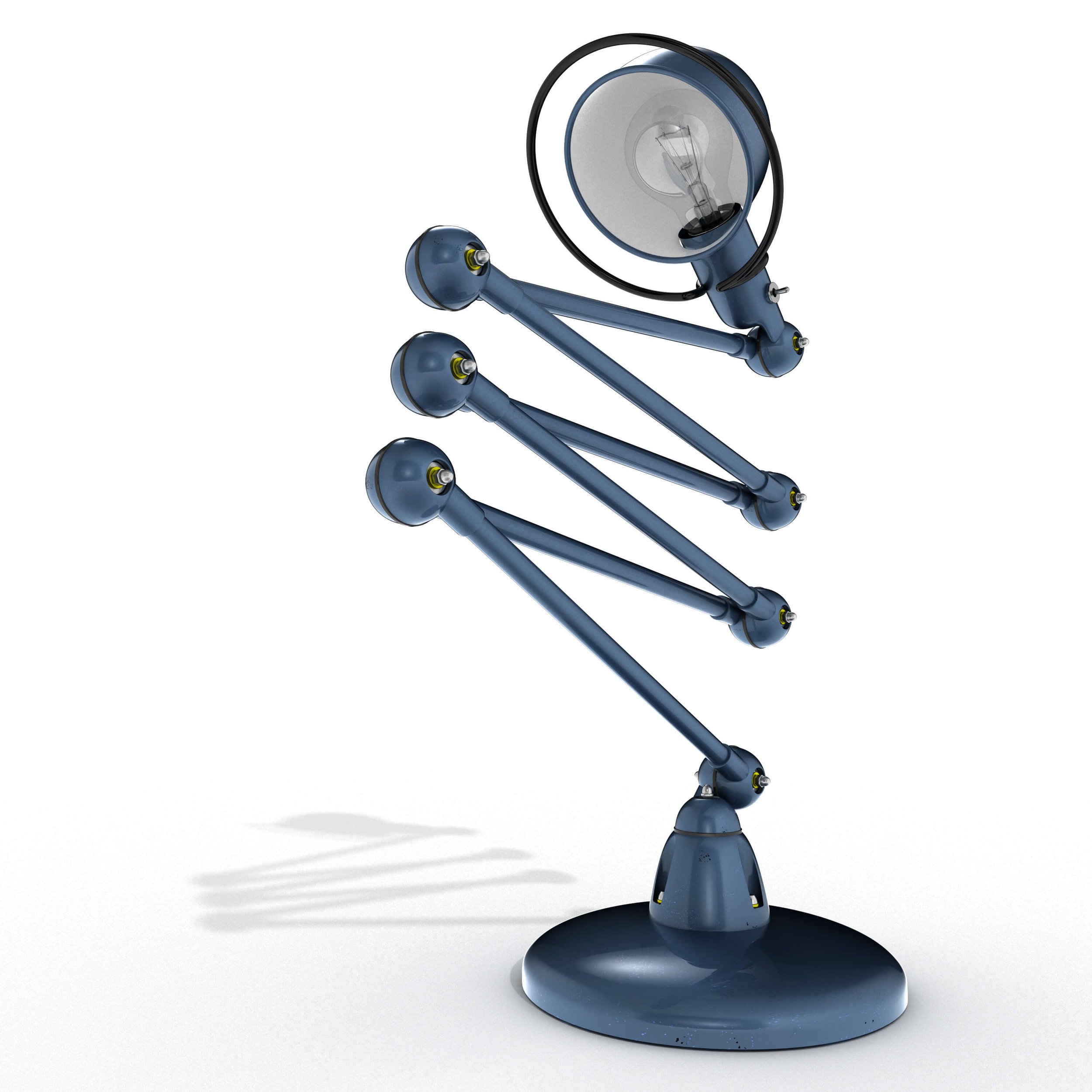 Three-quarter angled view of the Jieldé lamp showcasing shadow play across the metal body and joints.