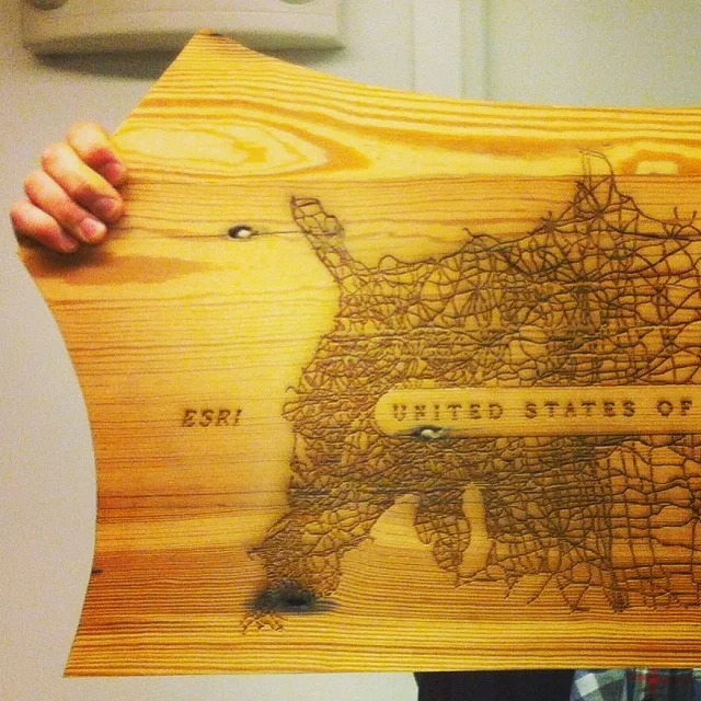Collaborative work with David Buckley Borden and Ryan Habbyshaw for the Wild West exhibit at Bodega , Summer 2014. Shield map takes primary and tertiary ESRI highway data and nests it within the iconography of road signs and the US Forest Service emblem. Infrastructure and road construction play major roles in the displacement of ecological systems; using salvaged pine and an inverted map we attempt to call attention to these historical conflicts. Learn more about the other talents involved here , and an interview with DBB here .