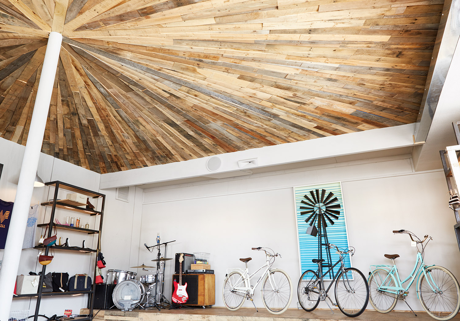 When Sarah and Aaron were building out the shop, Sarah drove all over town collecting old pallets and they created this cool ceiling out of the materials.