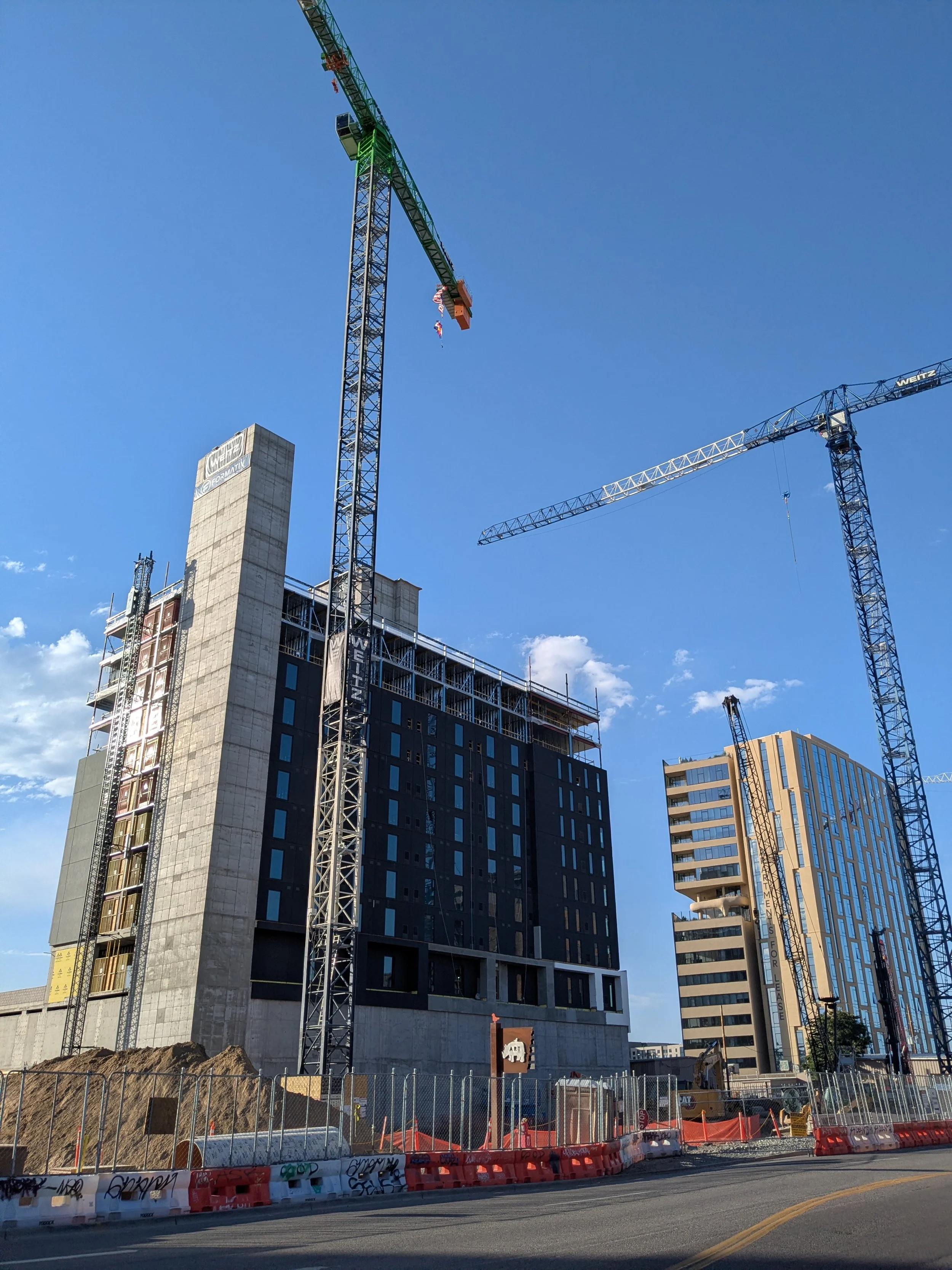 Cranes and apartment complexes being built in RiNo, Denver, Colorado