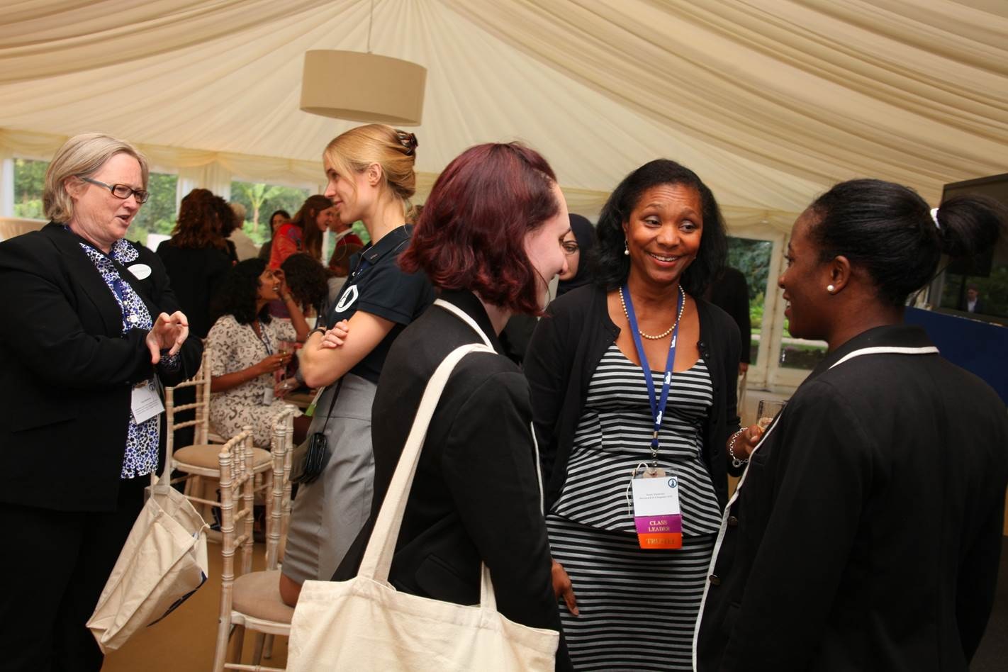  Dr Kate Blackmon (far left), Karen Stevenson and Rhodes Project staff Zoe Johannes and Emefa Agawu, Courtesy of Rhodes House. 