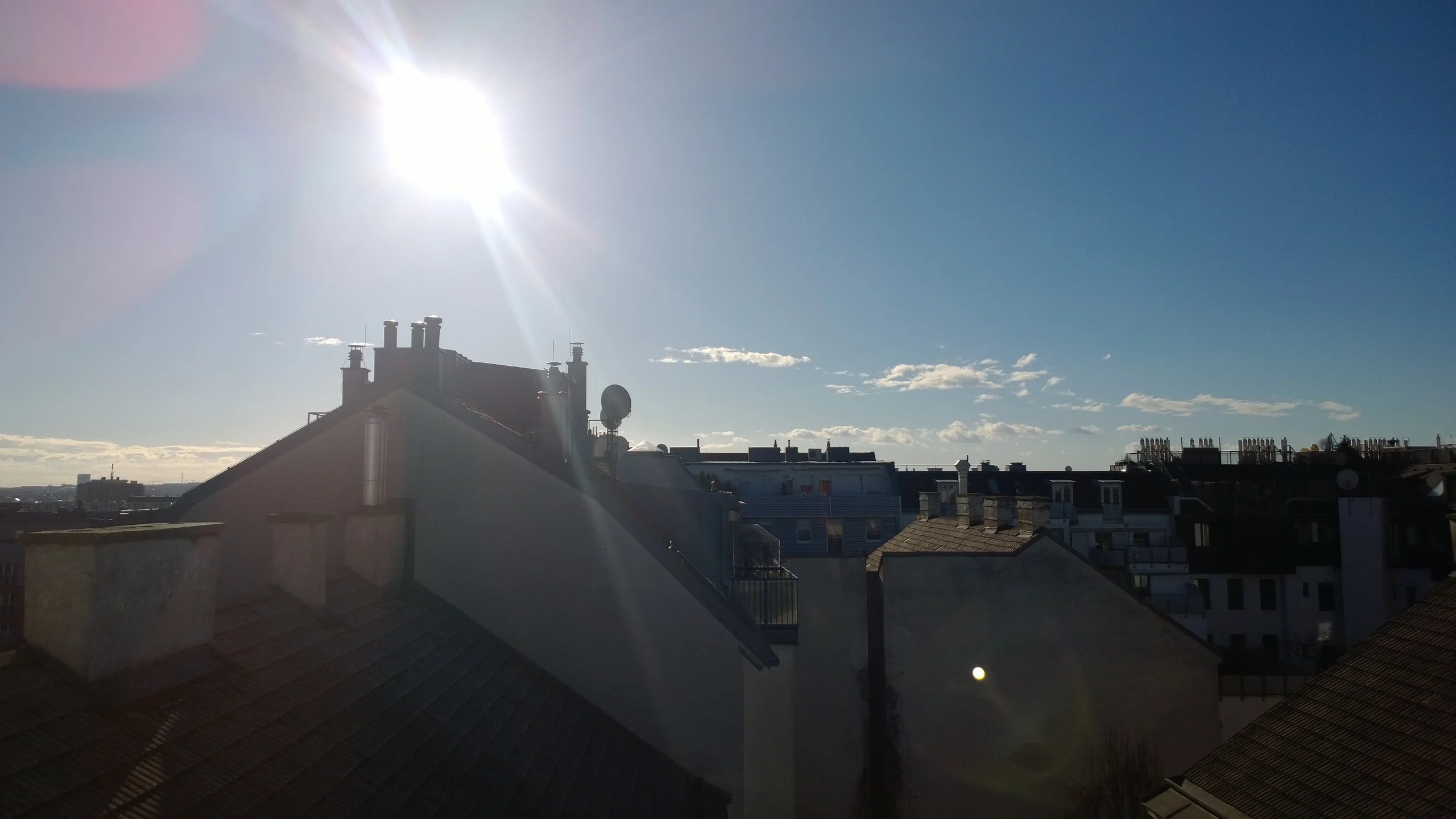 The lens is extremely prone to flares (even if the light source is not directly visible in the frame)