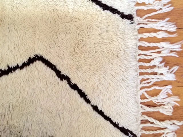 I love the irregular fringe on mine. Each one is special and unique. 