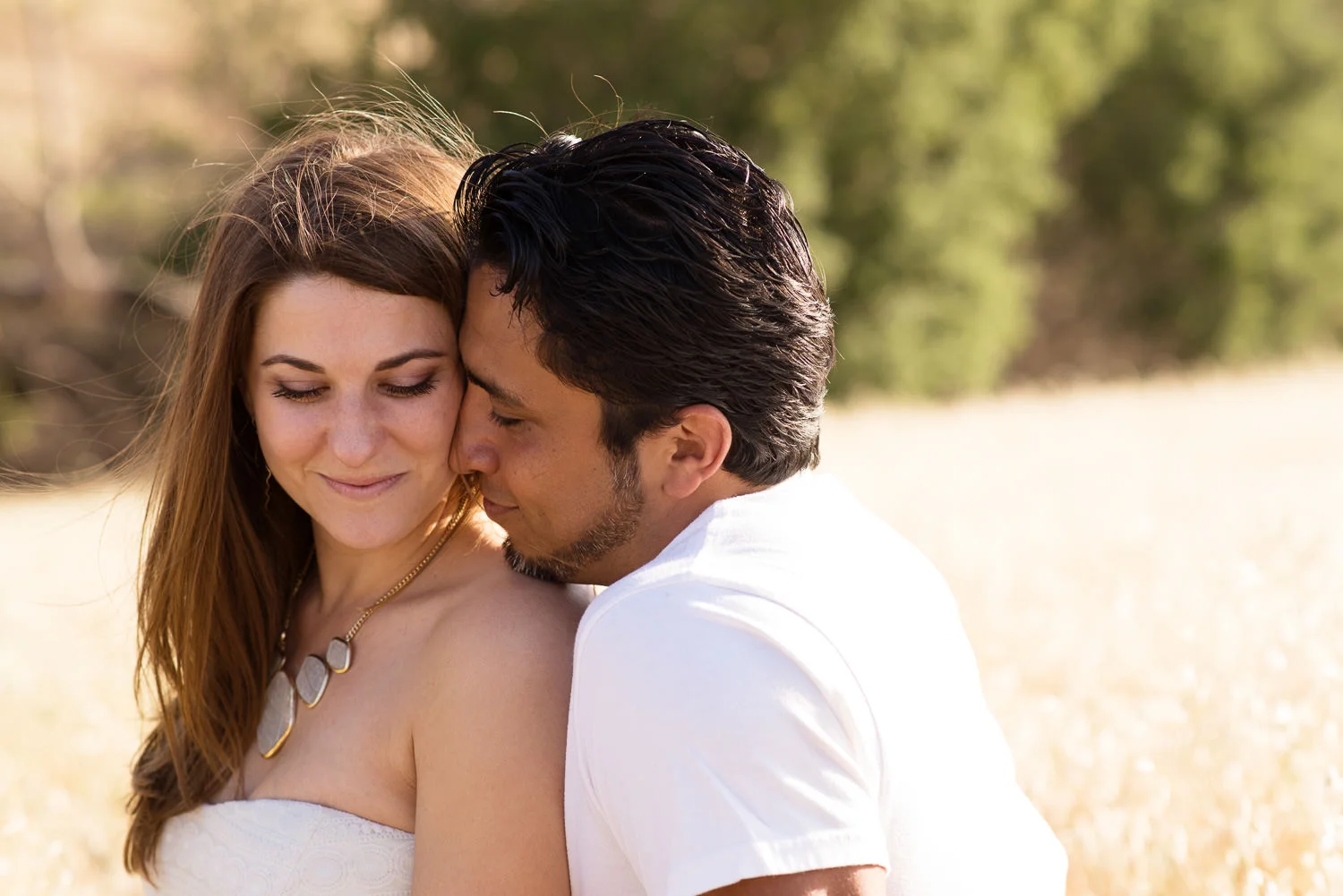 f27-photography-ventura-county-thousand-oaks-engagement-golden-field-getting-close.jpg