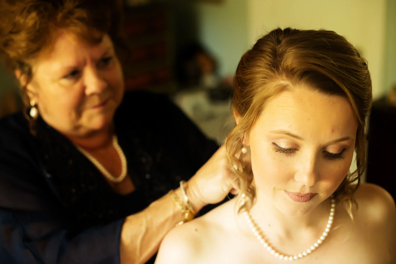 f27-Photography-Ojai-Wedding-February-2014-Bride-Has-Mom-Put-On-Final-Touches.jpg