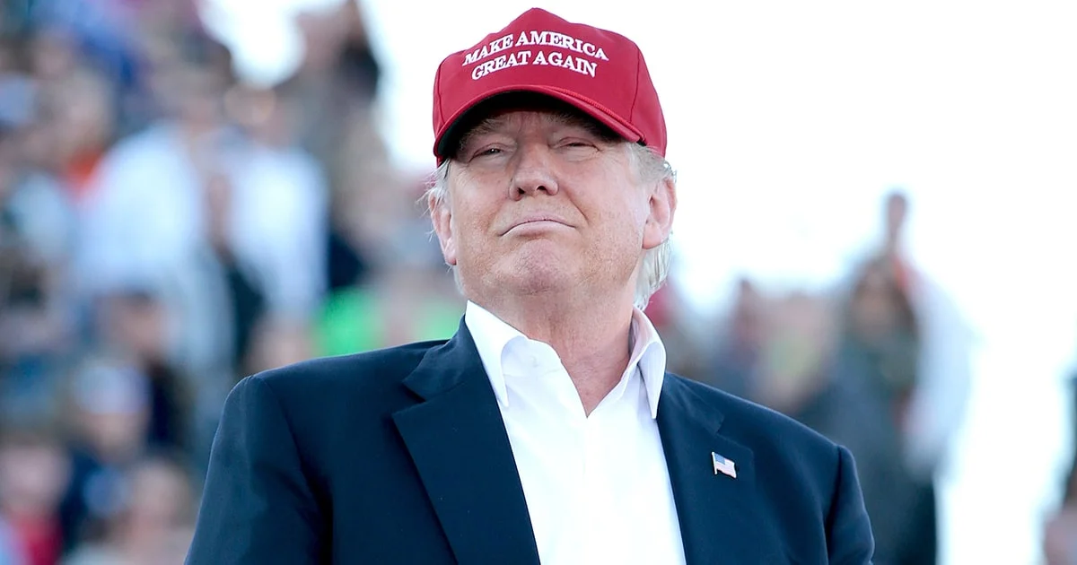 Donald Trump in his signature red cap. Image courtesy of Usmagazine.com