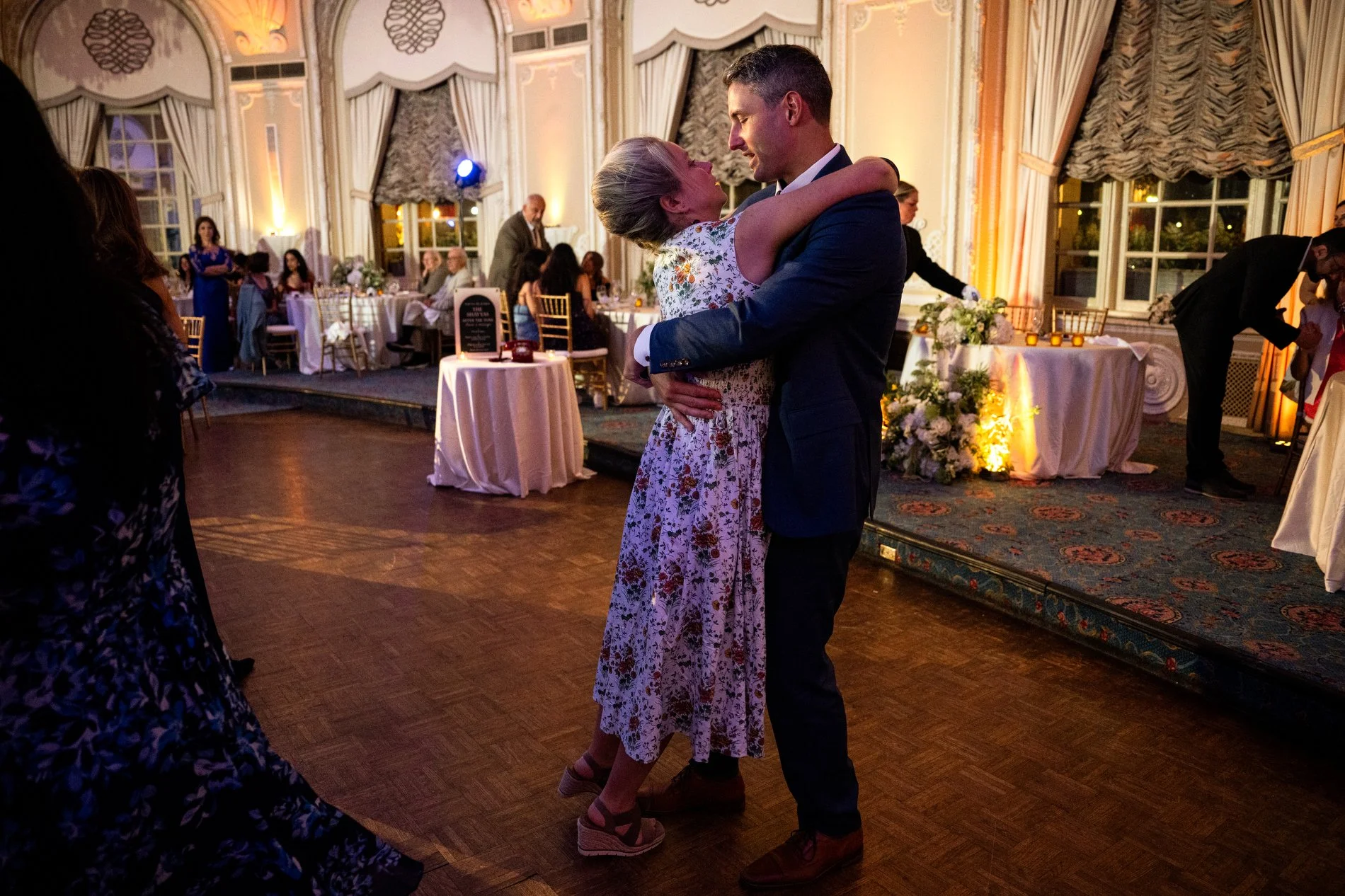 Guests dance during a Boston wedding photojournalism session at Fairmont Copley Plaza Hotel.