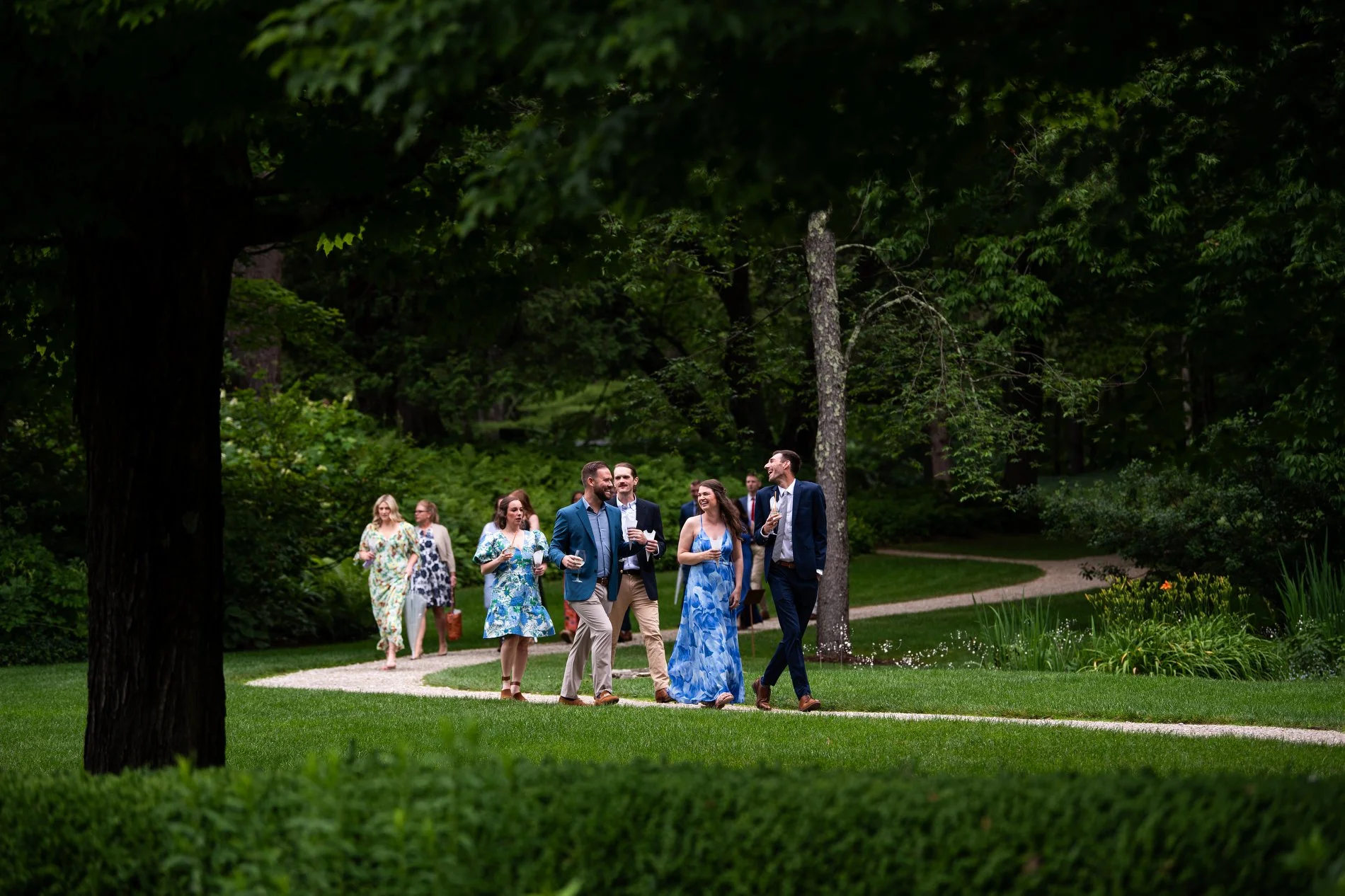 Guests arrive for a romantic Berkshires wedding ceremony in the French garden at The Mount.