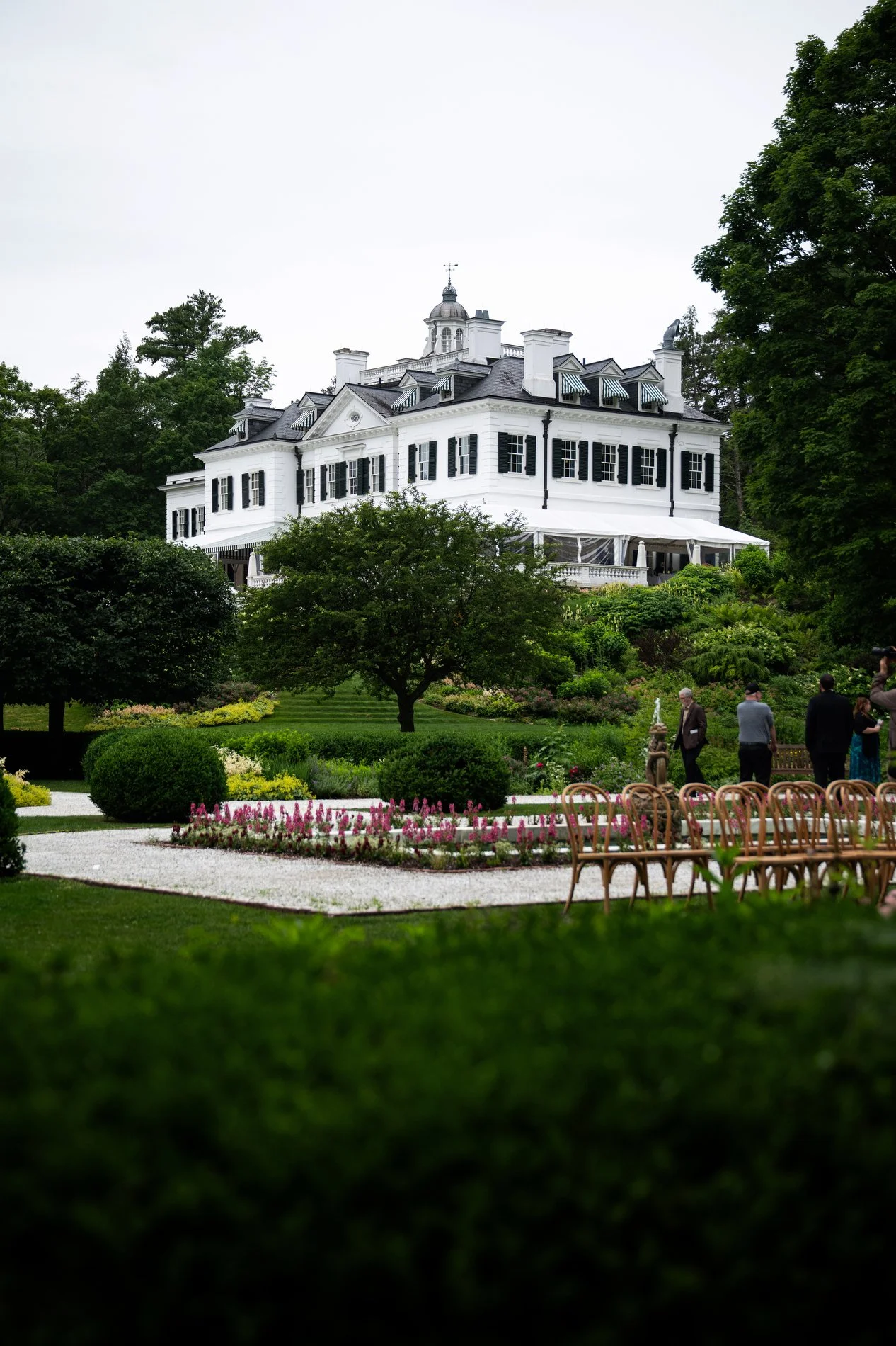A ceremony is set up in the French Garden at The Mount for a romantic Berkshires wedding.