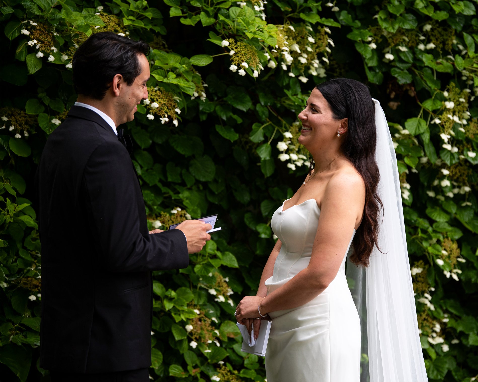 A bride and groom share vows in the Italian garden at The Mount during their romantic Berkshires wedding.