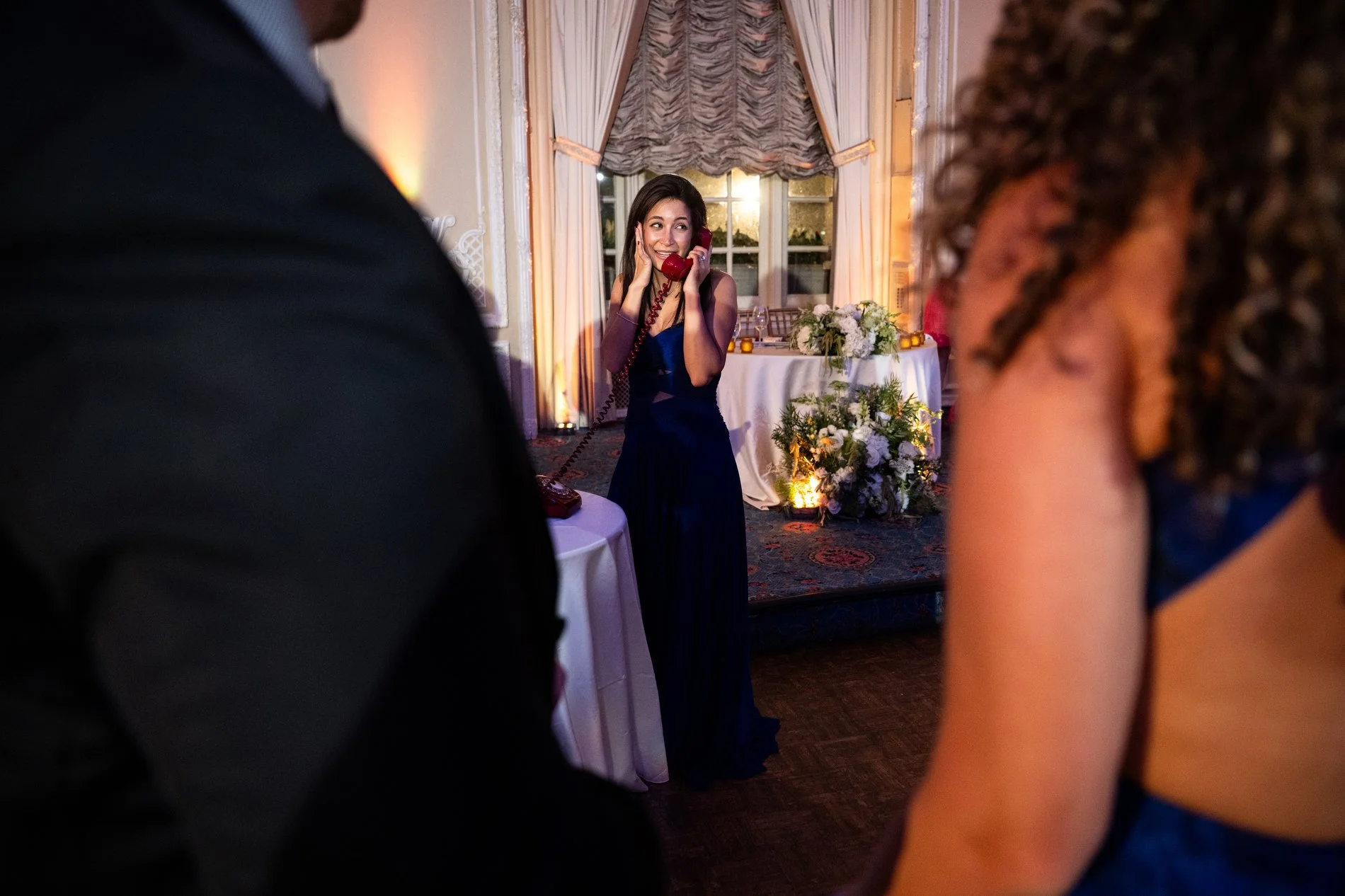 A guest leaves a voicemail for the newlyweds during a Boston wedding photojournalism session at Fairmont Copley Plaza Hotel.