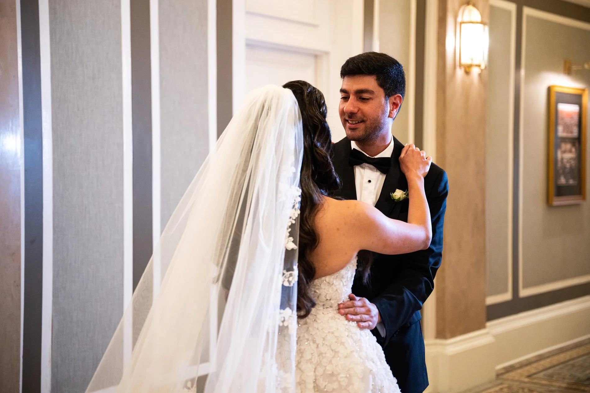 A couple has their first look at Fairmont Copley Plaza Hotel before their Boston hotel wedding.