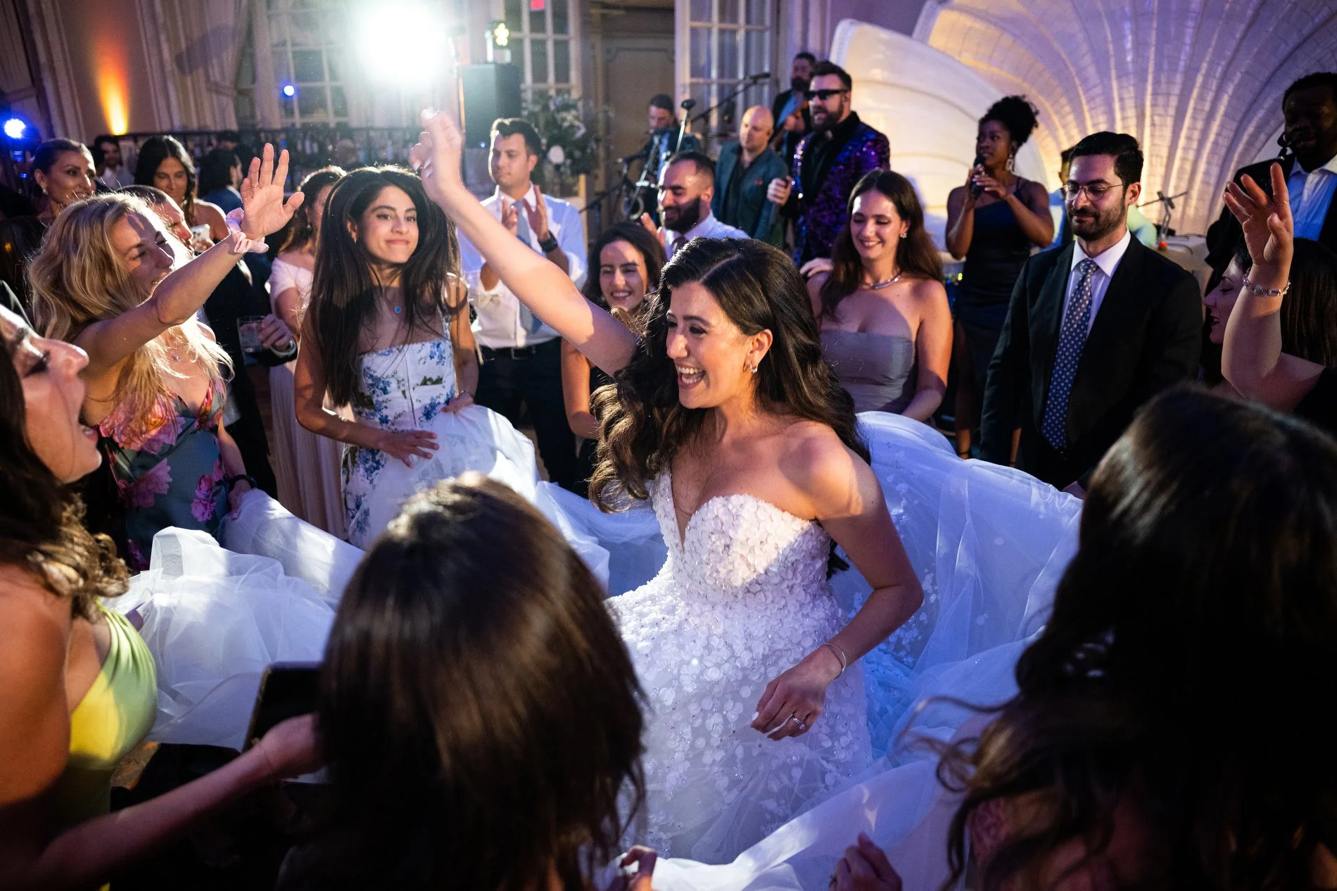 Guests dance during a Boston wedding photojournalism session at Fairmont Copley Plaza Hotel.